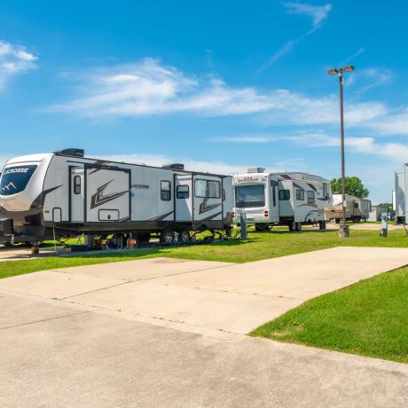 parked camper trailers at Lost River RV Park with grassy lots and clean concrete rv spaces